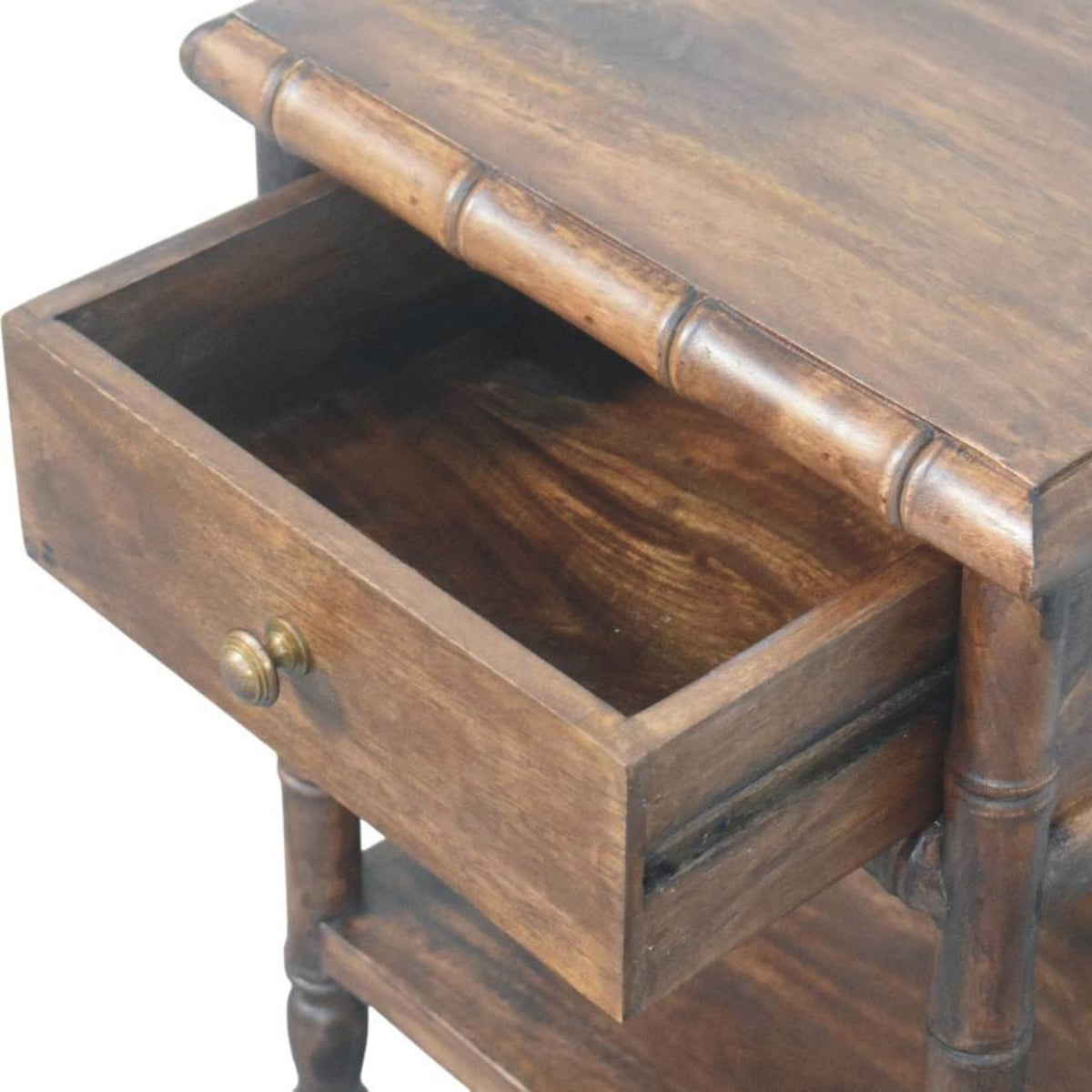 Wooden nightstand with open drawer on a white background