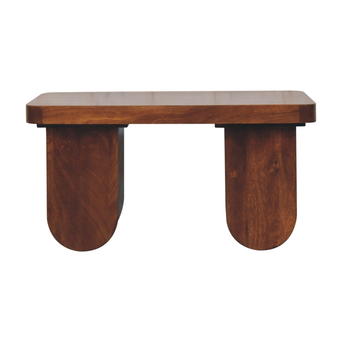 Front view of a solid mango wood coffee table in a chestnut finish, characterized by its thick top and two chunky, U-shaped base legs.