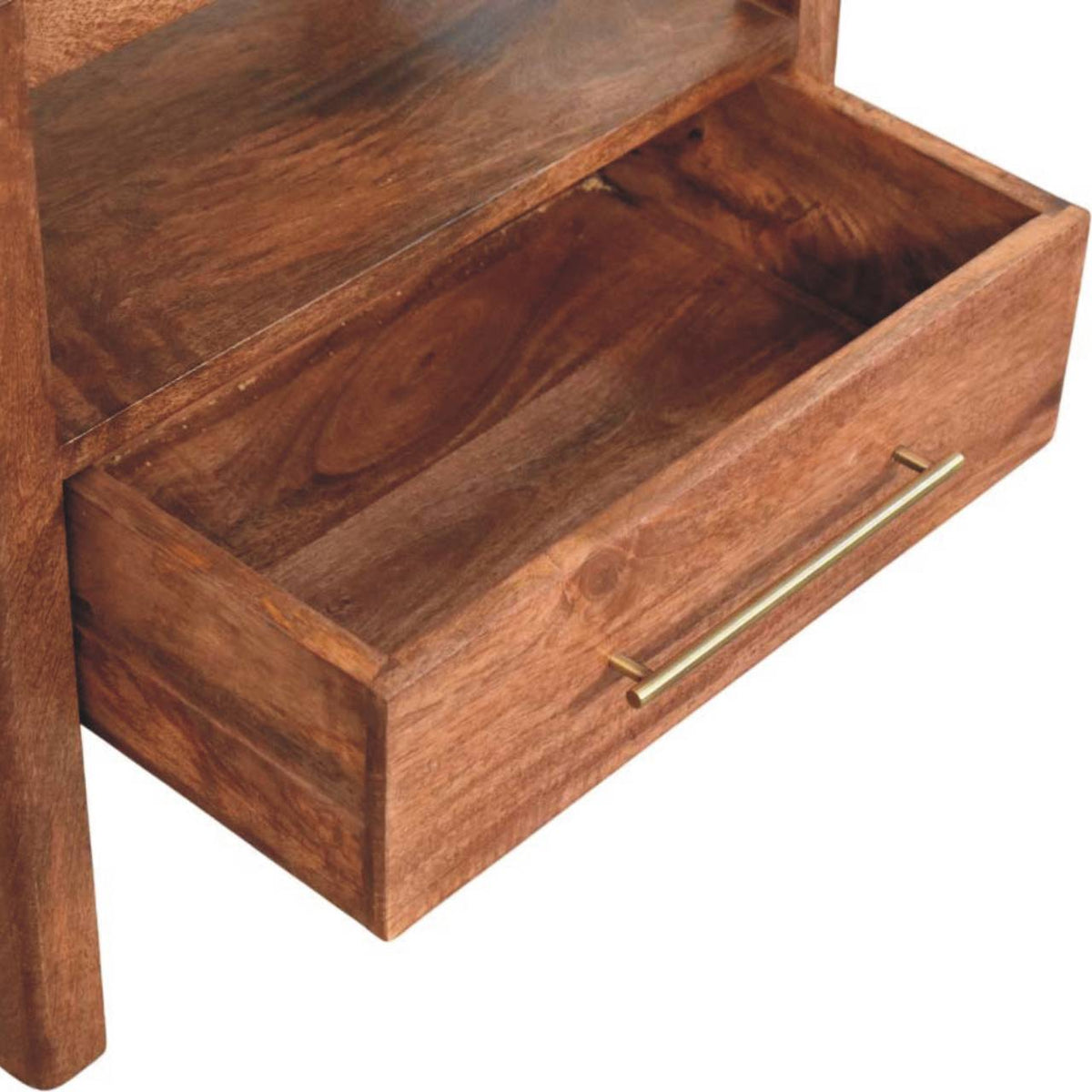 High-angle view showing the drawer pulled open on a honey caramel solid mango wood bedside table, revealing the interior storage compartment.