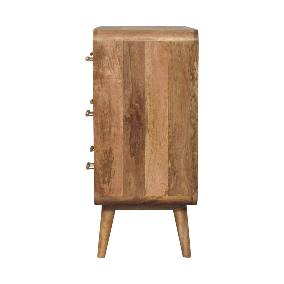 Straight-on side profile view of a solid mango wood chest of drawers in natural oak, showing the smooth, flat side panel and tapered legs.