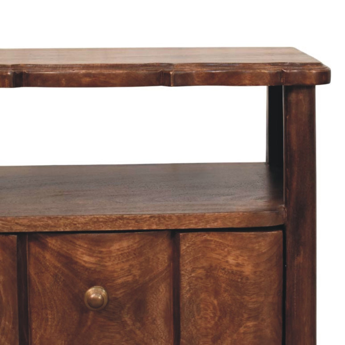 Close-up detail of the open top shelf on a roasted almond bedside table, showcasing the solid wood construction and wavy top edge.
