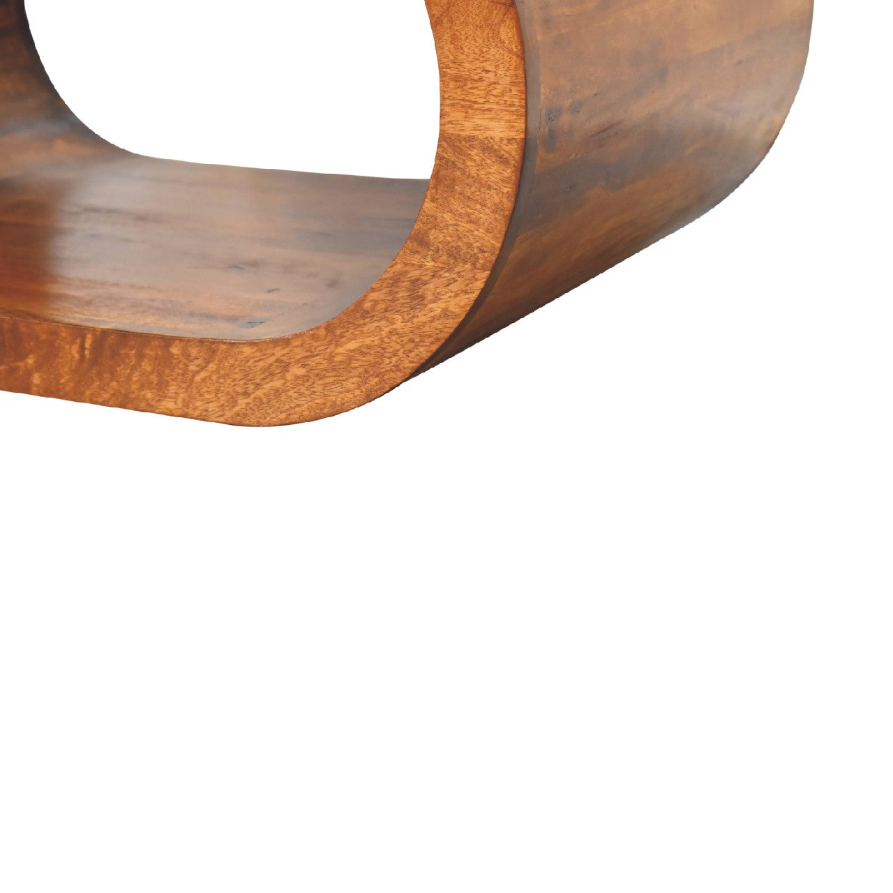 Close-up of a wooden coffee table with a curved design on a white background