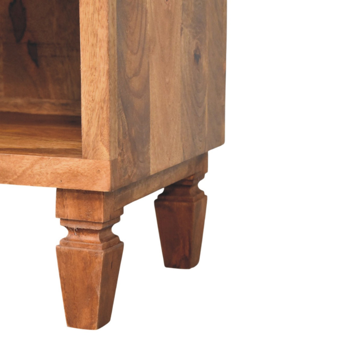 Close-up of a wooden shoe cabinet with detailed legs on a white background