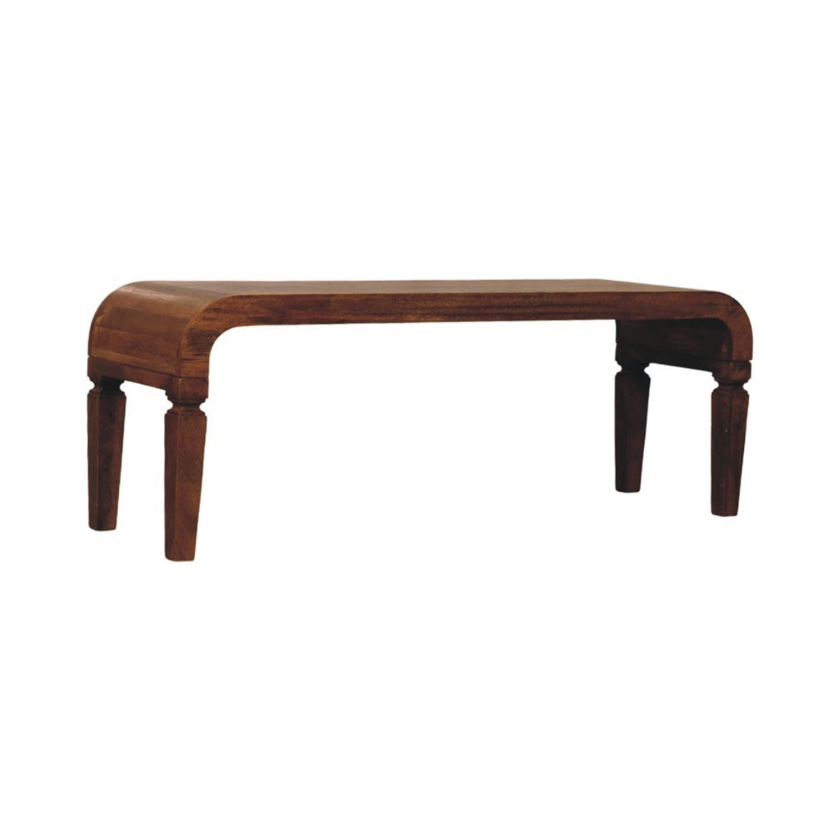 Three-quarter view of an amber oak finish solid mango wood coffee table, highlighting its seamless curved silhouette.