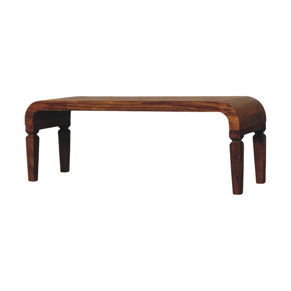 Angled front perspective of a solid mango wood coffee table in a warm amber oak finish.
