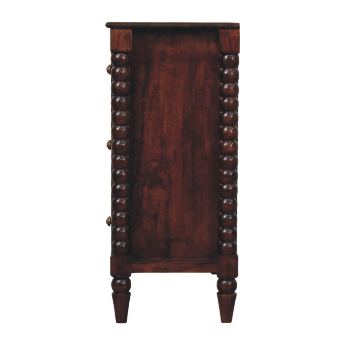 Straight-on side profile view of a Winewood Oak solid mango wood chest, displaying a flat side panel flanked by the decorative spindle columns.