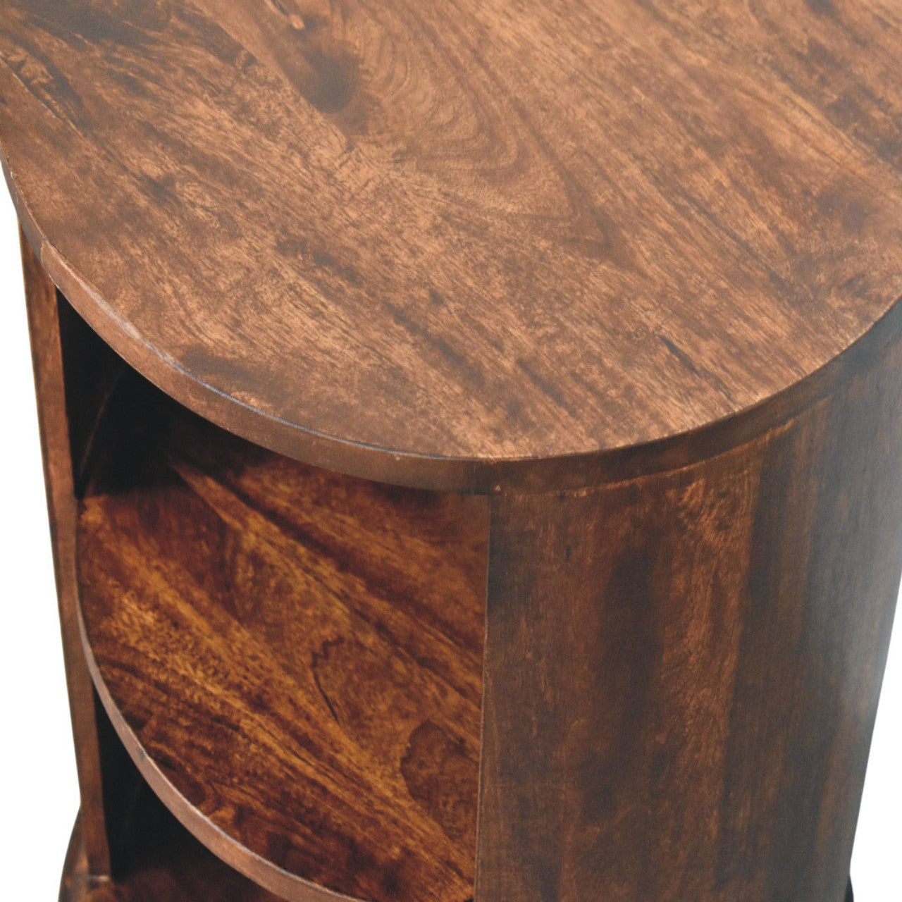 Close-up of a wooden side table with a round top and cylindrical base.