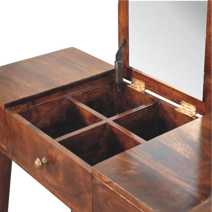 Wooden vanity table with mirror and open drawer on a white background