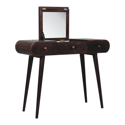 Wooden vanity table with a mirror on a white background