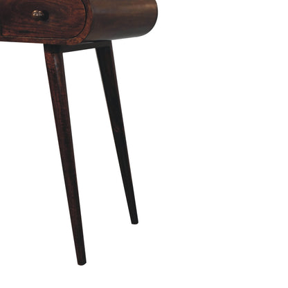 Wooden vanity table with dark finish on a white background