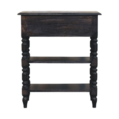 Back view of a carbon ash solid mango wood side table, showing the solid wood back panel behind the top drawer space.