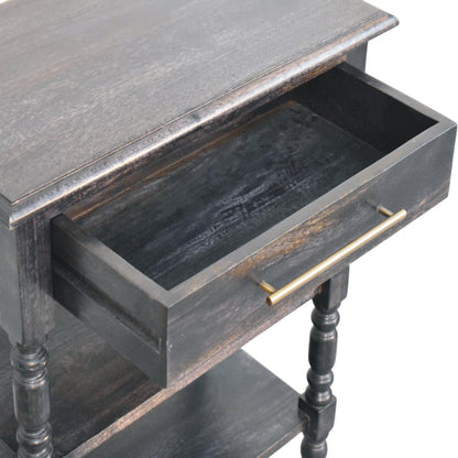 High-angle view showing the drawer pulled open on a carbon ash solid mango wood side table, revealing the dark wooden interior compartment.