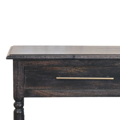 Close-up detail of the top drawer on a carbon ash side table, showcasing the dark wood grain and a sleek brass bar handle.