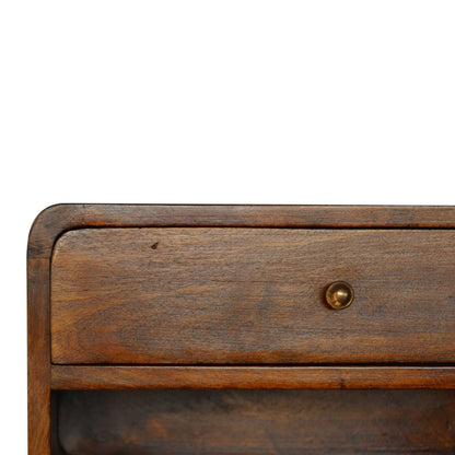 Close front left angle of Chestnut Curve Floating Bedside showing shiny knob and chestnut finish detail