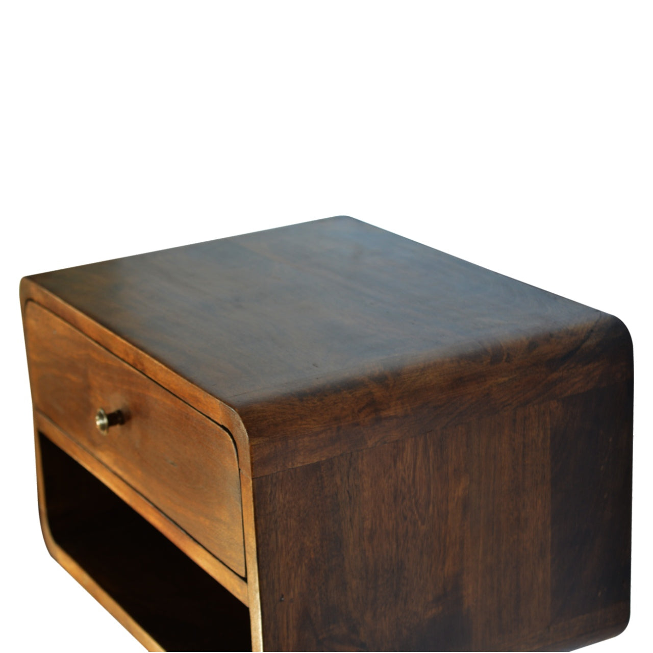 Top right angle view of Chestnut Curve Floating Bedside showing surface and natural mango wood grain
