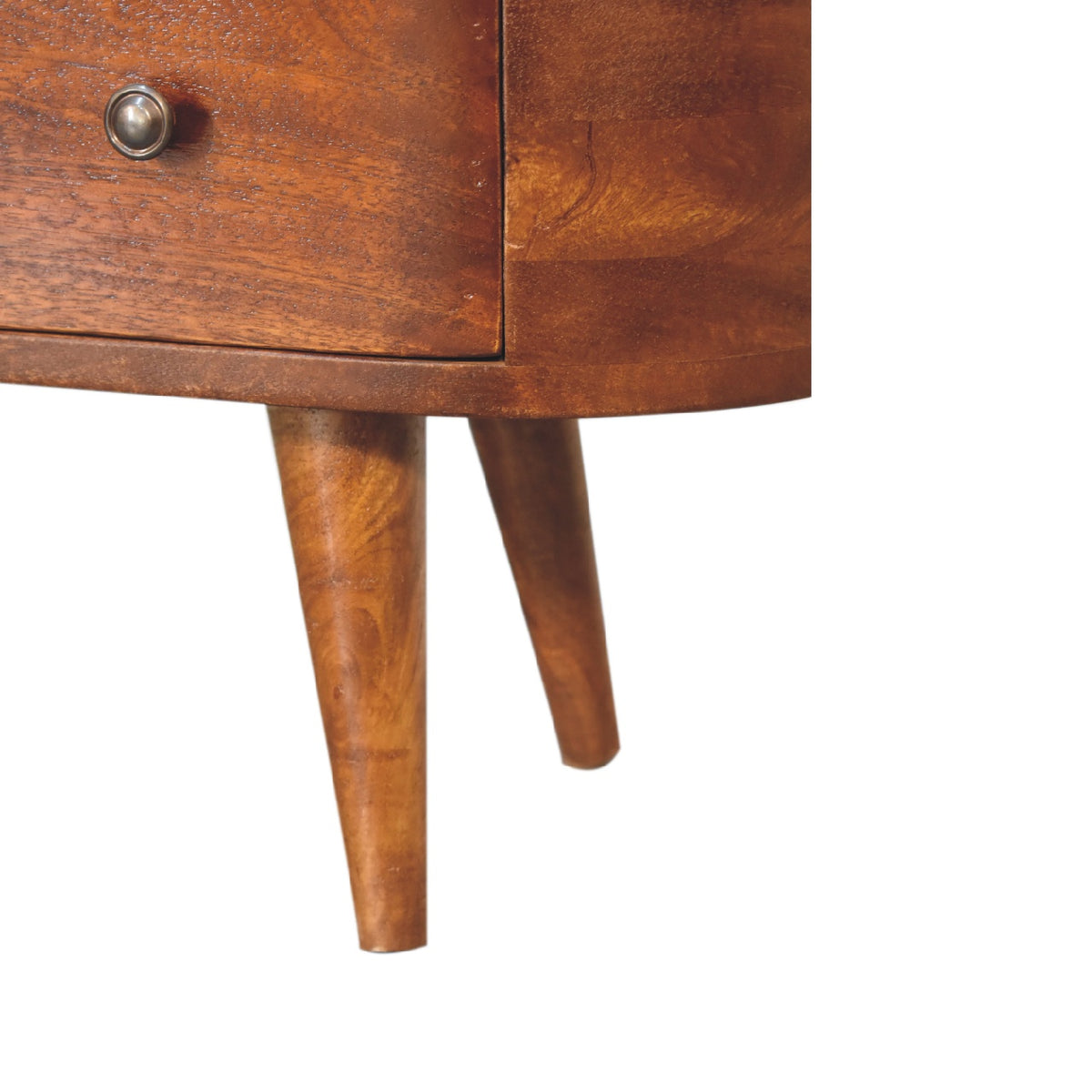 Close-up of a wooden media unit with a knob on a white background