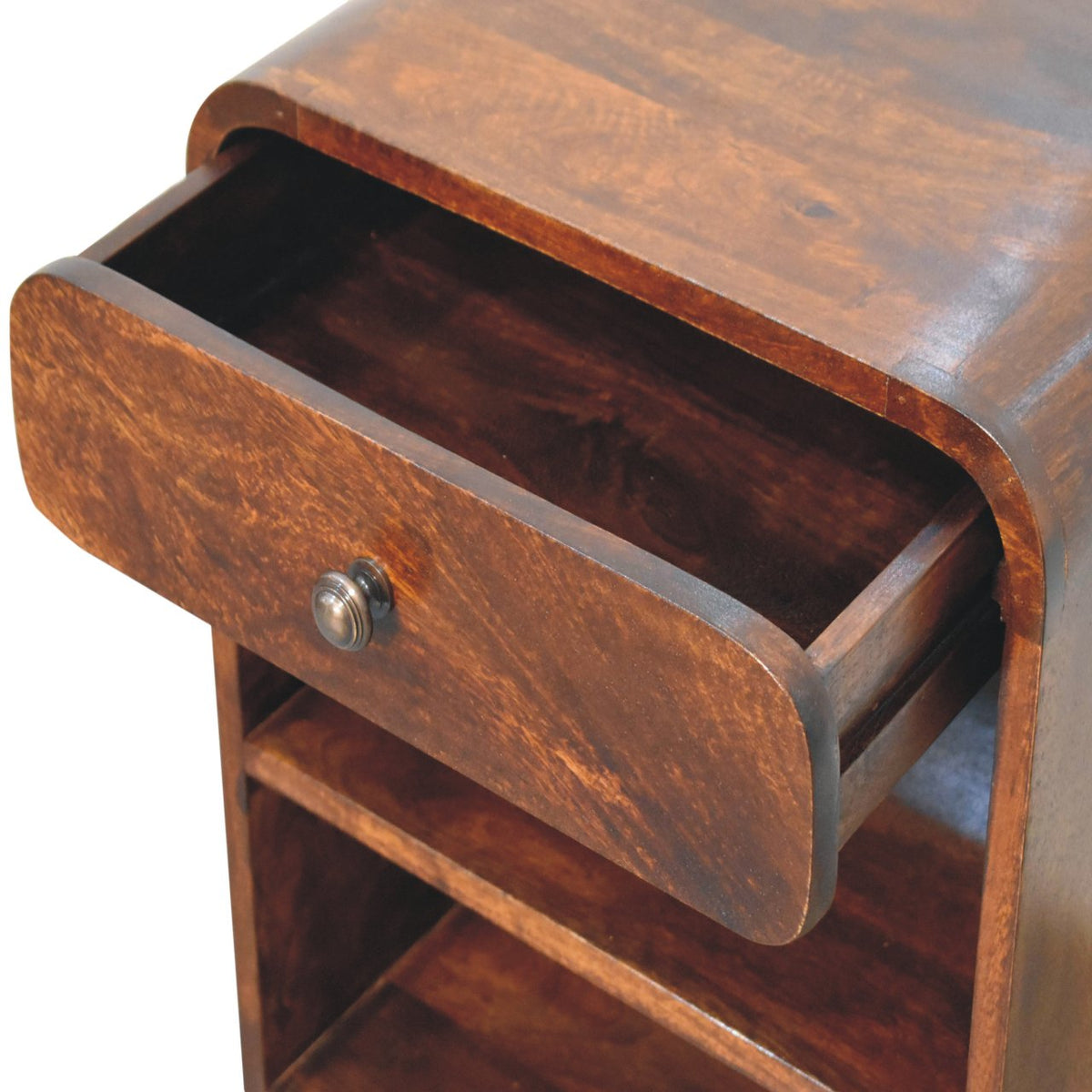 High-angle view showing the drawer pulled open on a chestnut solid mango wood bedside table, revealing the wooden interior storage compartment.