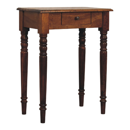 Wooden writing desk with a single drawer on a white background