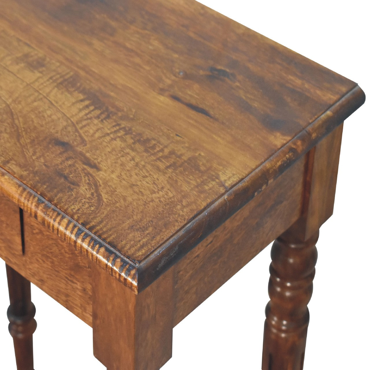 Wooden writing desk with a worn surface on a white background