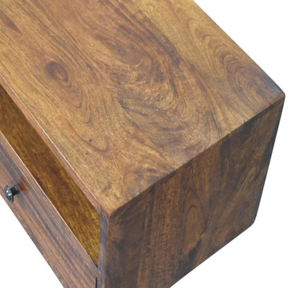 Wooden drawer of tv stand with a focus on the top surface