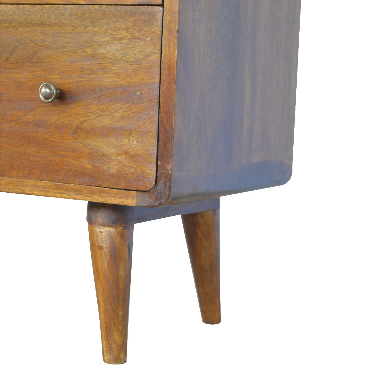 Lower right angle of Curved Chestnut Chest Of Drawers highlighting Nordic-style legs