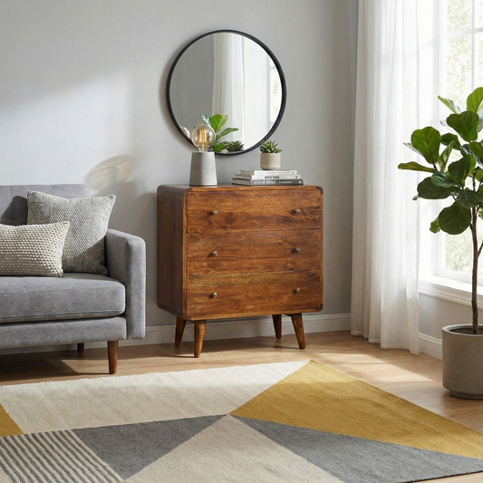 Curved Chestnut Chest of Drawers styled in a bedroom or apartment interior