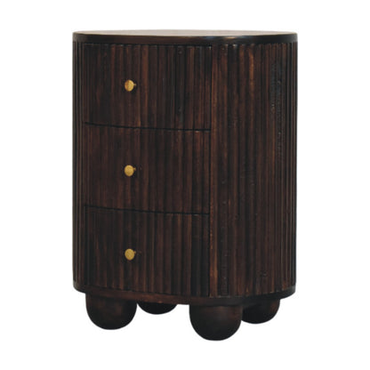 Angled right view of a solid mango wood bedside table in velvet mocha, showcasing its continuous fluted surface wrapping around the curves.