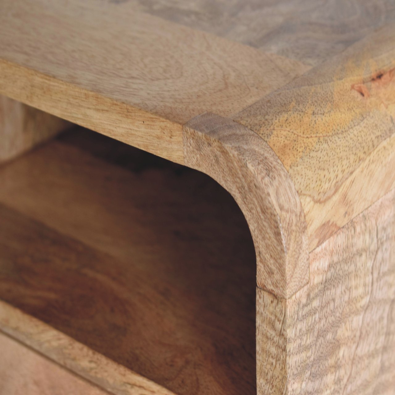 Close upper right angle of Extra Mini Wall Mounted Curved Oak Bedside showing open shelf and oak finish