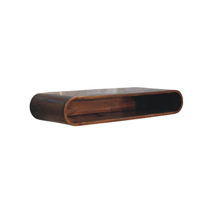 Floating arc media console in solid mango wood, Chestnut finish – left angle view