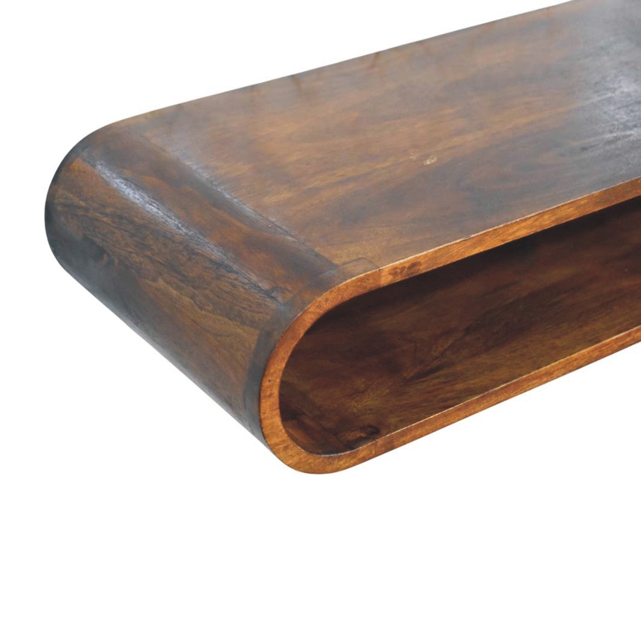 Floating arc media console in solid mango wood, Chestnut finish – wood grain detail, front left elevated close-up