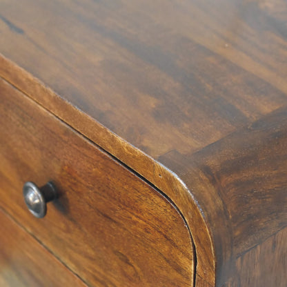 Close upper right angle of Floating Mini Chestnut Bedside showing mango wood grain and finish detail