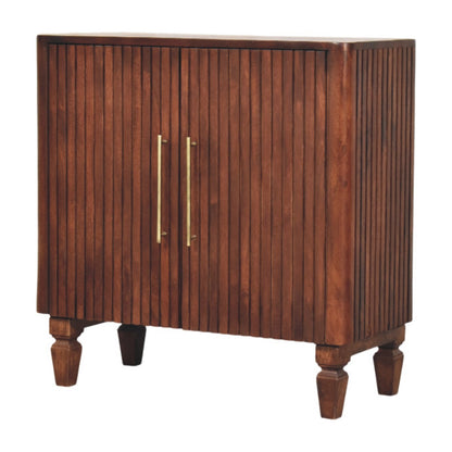 Wooden cabinet with two gold handles on a white background