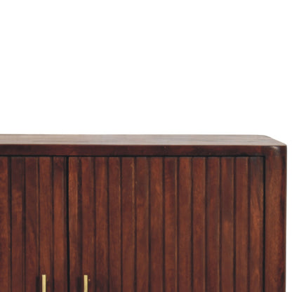 Wooden sideboard with vertical slats and gold handles on a white background