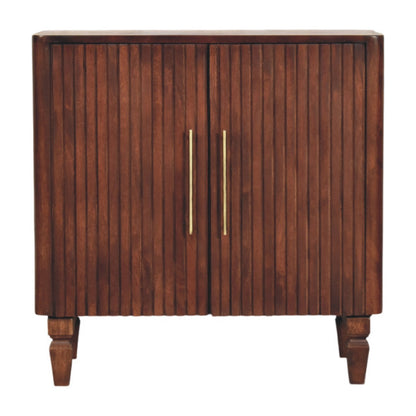 Wooden cabinet with two doors and gold handles on a white background
