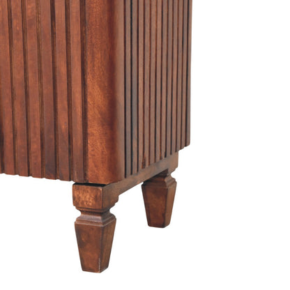 Close-up of a wooden cabinet with a white background