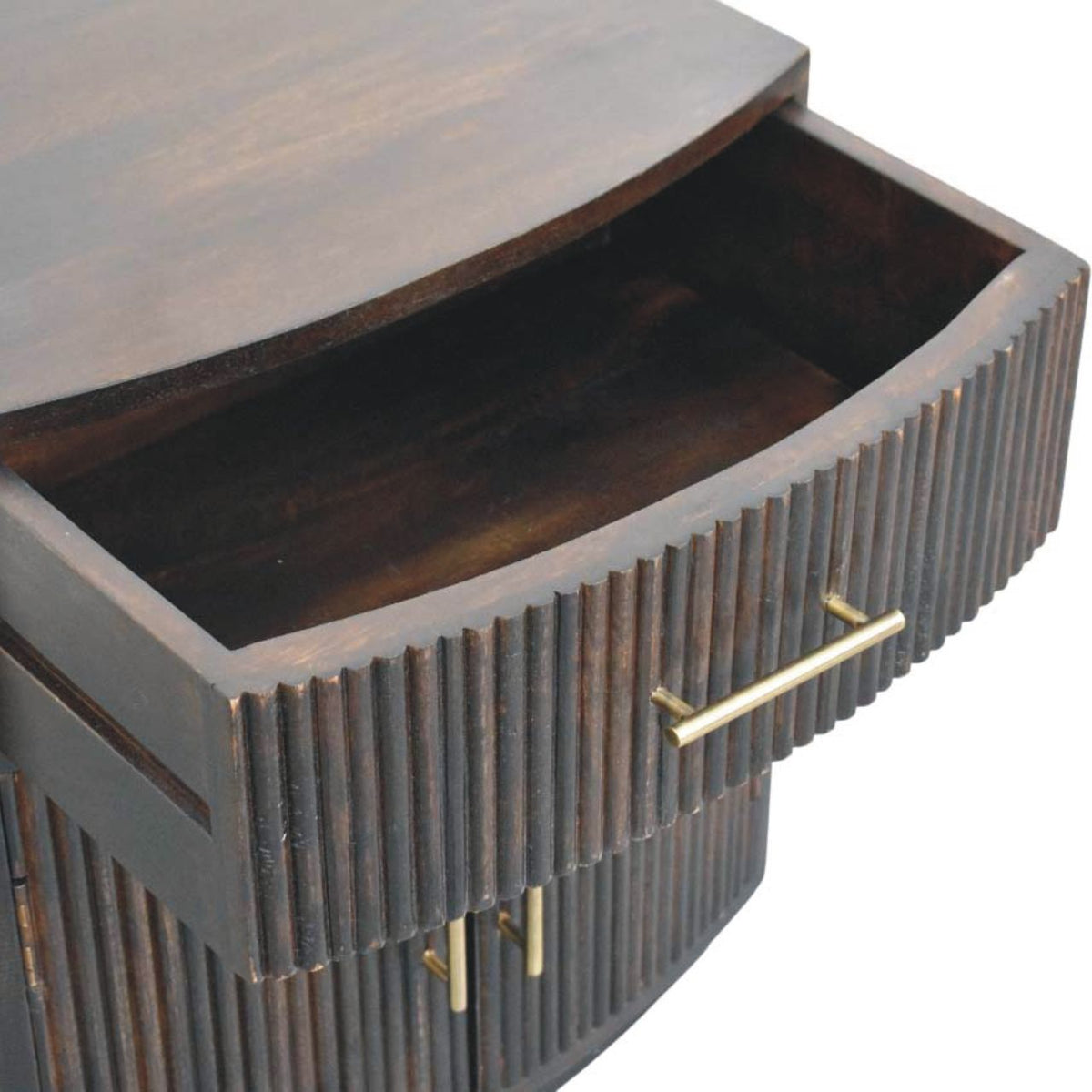 High-angle view showing the top drawer pulled open on a velvet mocha fluted bedside table, revealing the dark wooden interior storage compartment.