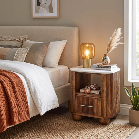 Fluted marble-top bedside table in solid mango wood, Golden Teak finish – lifestyle setting