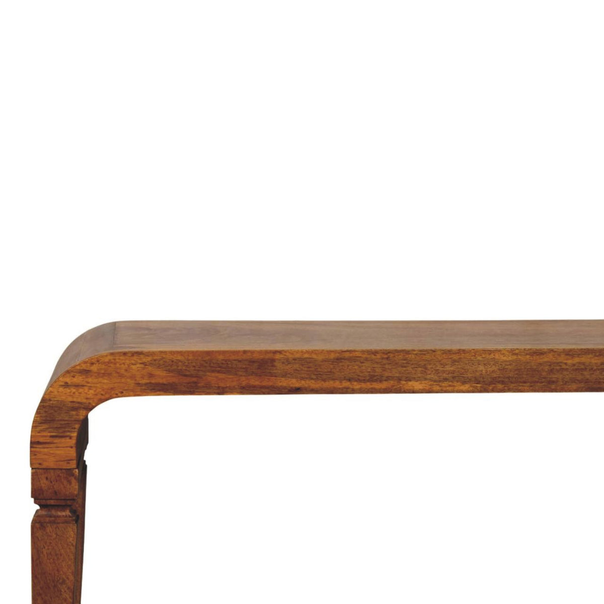 Close-up showing the smooth front edge and wood grain of a solid mango wood coffee table.