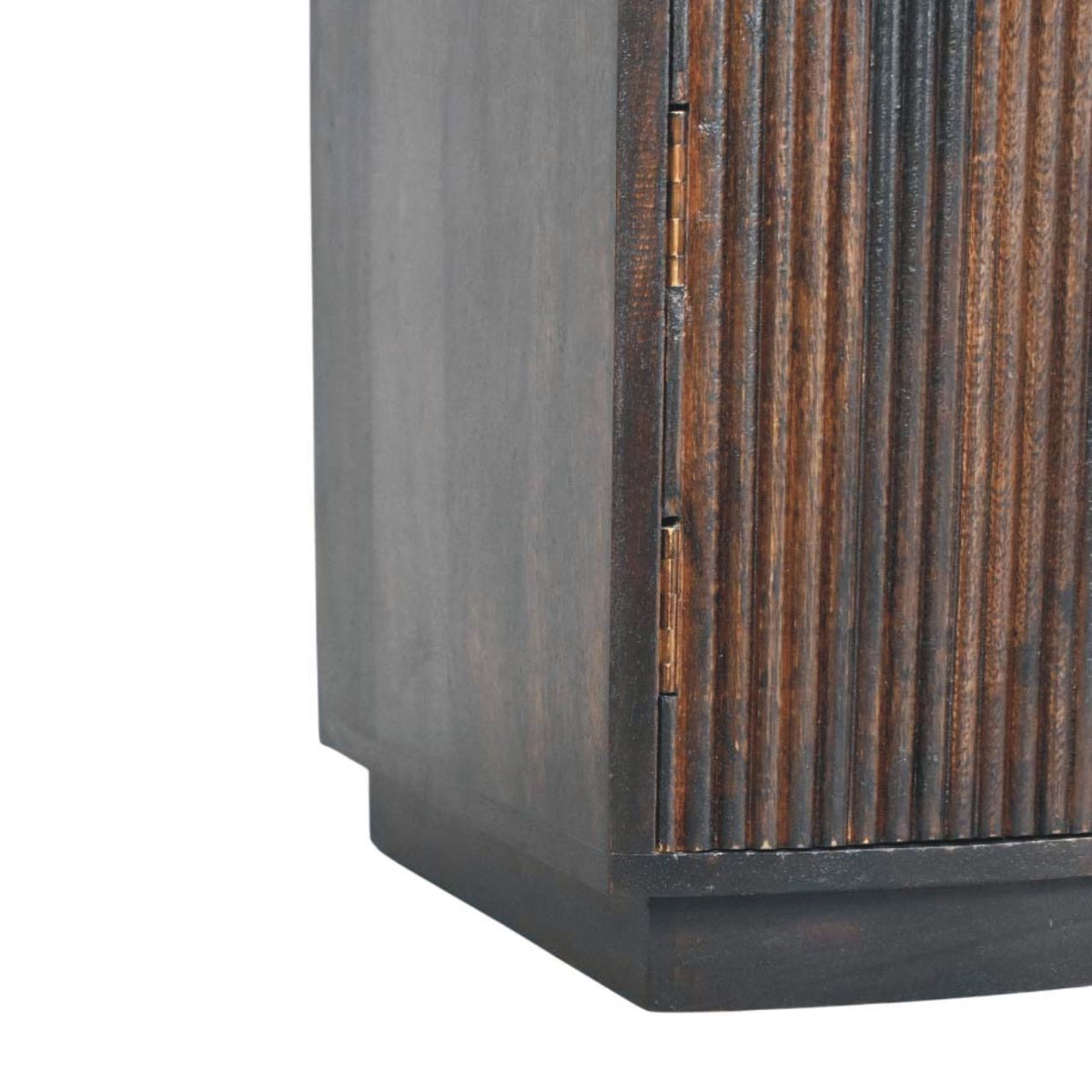 Close-up detail of the cabinet door hinges and the solid wood plinth base on a velvet mocha fluted bedside table.
