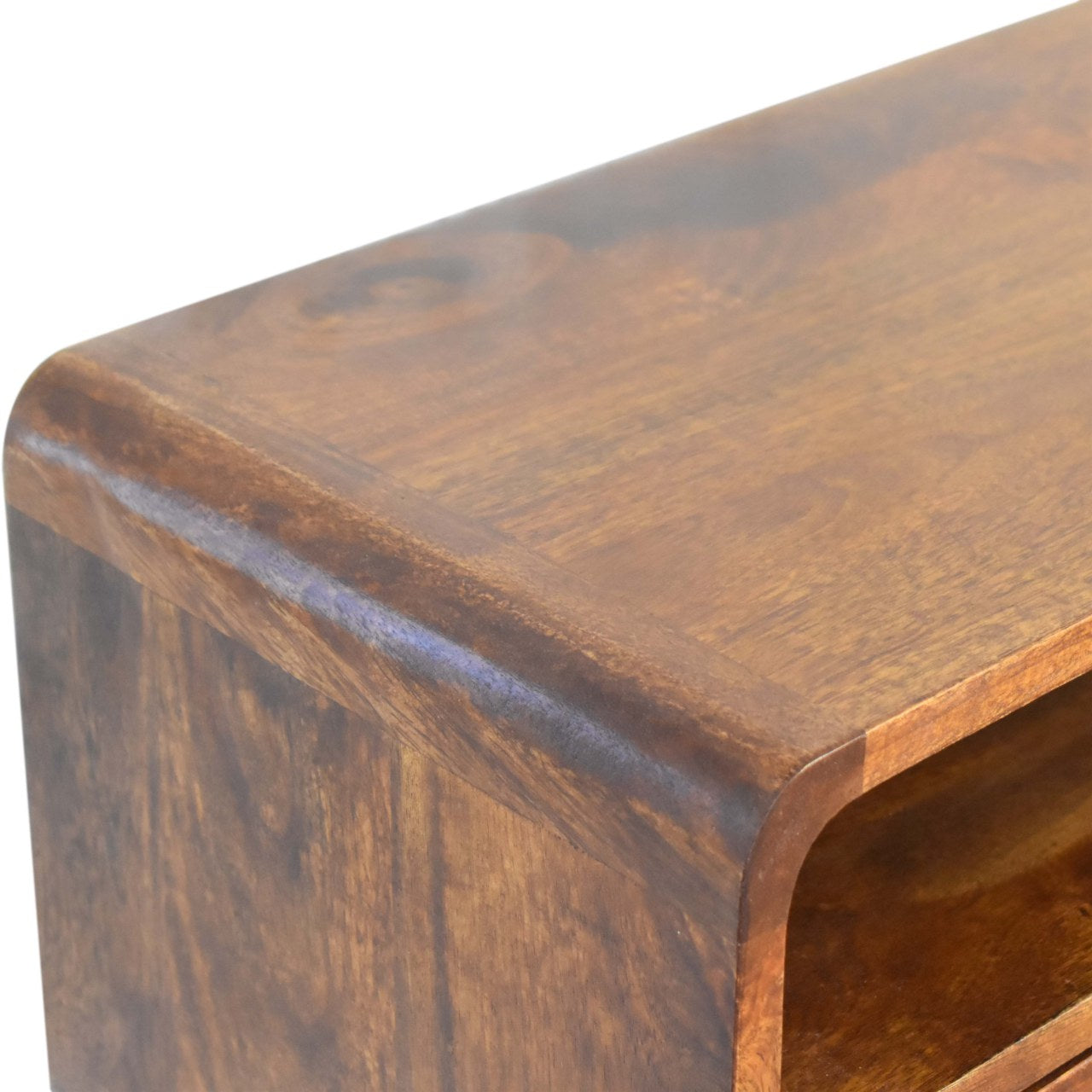 Close upper left angle of Mini Chestnut Console Table showing curved edges and chestnut finish