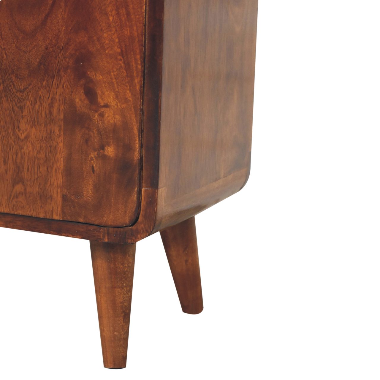 Close-up of a wooden cabinet with a white background