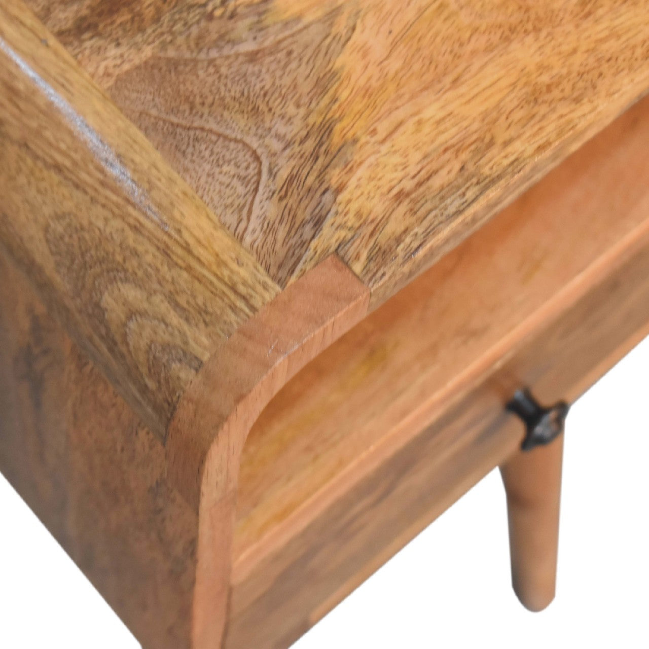 Close upper left angle of Mini Oak Curve Open Bedside showing mango wood grain and oak finish