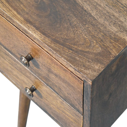 Wooden nightstand with metal handles on a white background