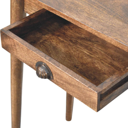 Wooden writing desk with a drawer and metal handle on a white background