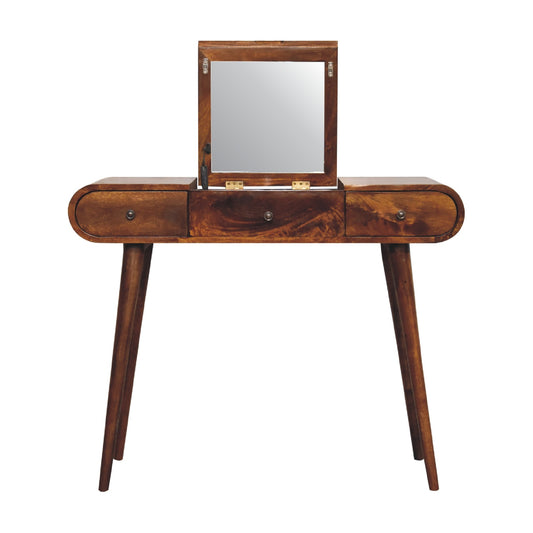 Wooden vanity table with mirror on a white background