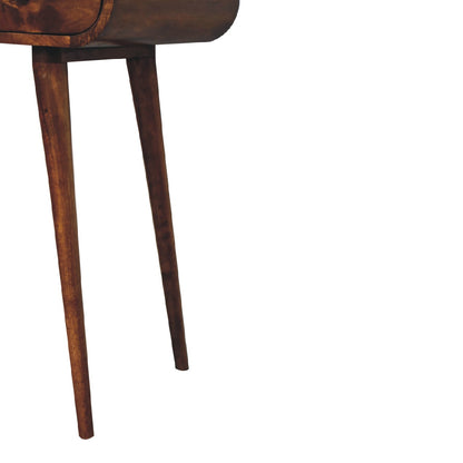 Close-up of the legs detail of a wooden vanity dressing table with a white background