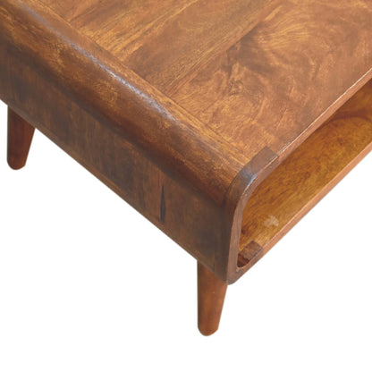 Close-up of a wooden media unit with a brown finish on a white background