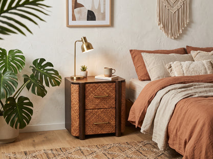 Lifestyle image of a velvet mocha mango wood and rattan 2-drawer bedside table.