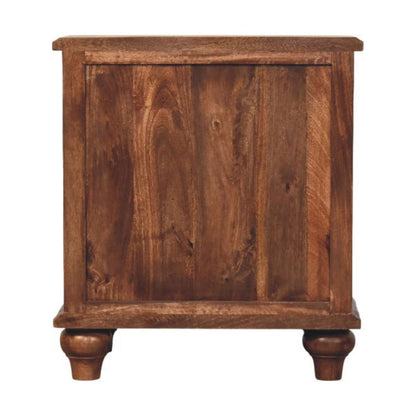 Back view of a roasted almond solid mango wood bedside table, showing the framed wooden back panel construction.