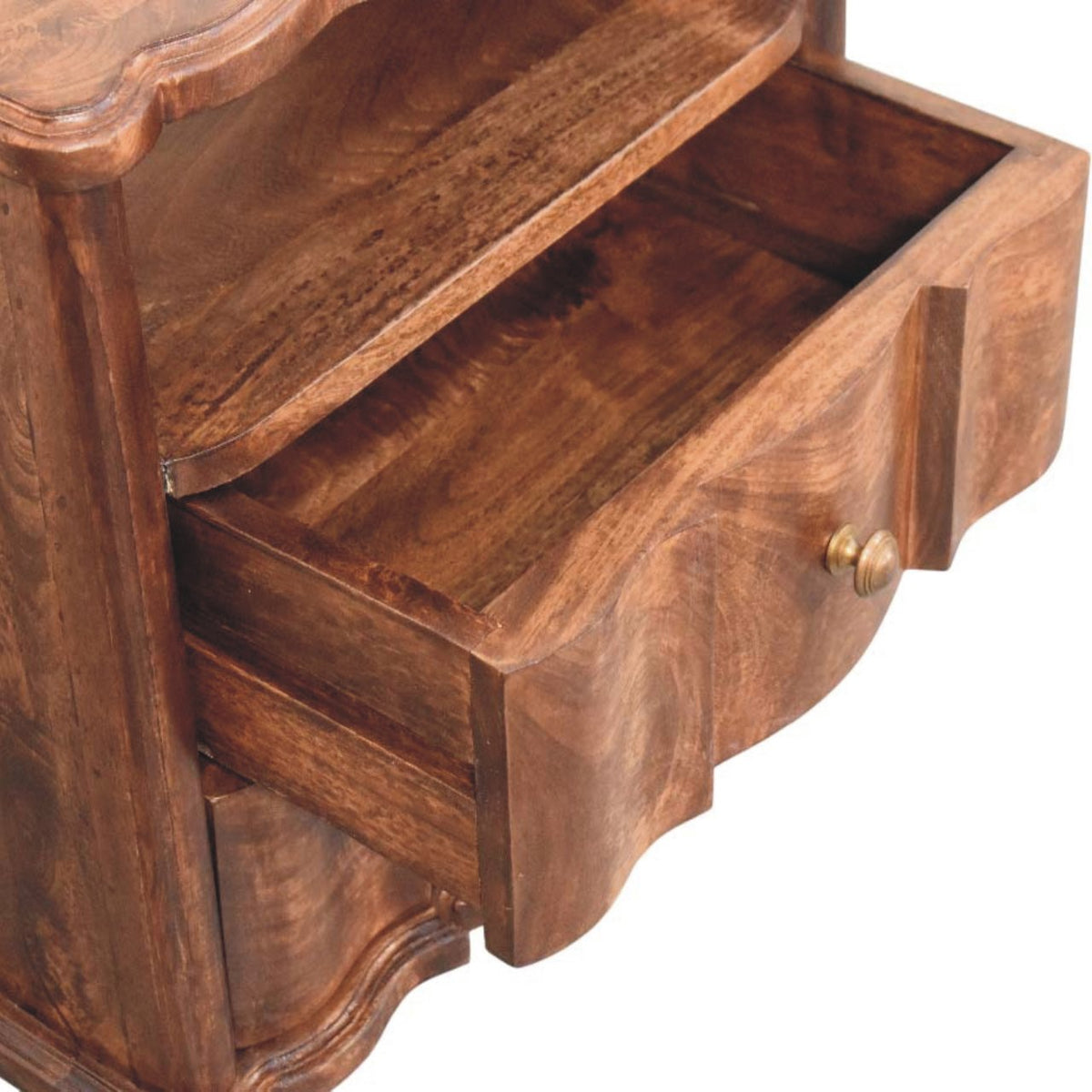 High-angle view showing the top drawer pulled open on a roasted almond solid mango wood bedside table, revealing the wooden interior compartment.